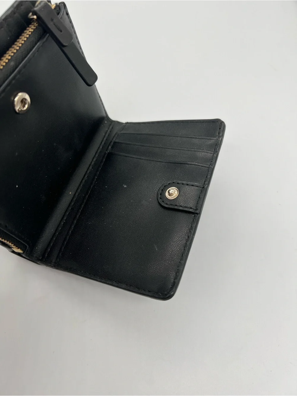 kate spade Black Pebbled Leather Zip Wallet with Gold Logo